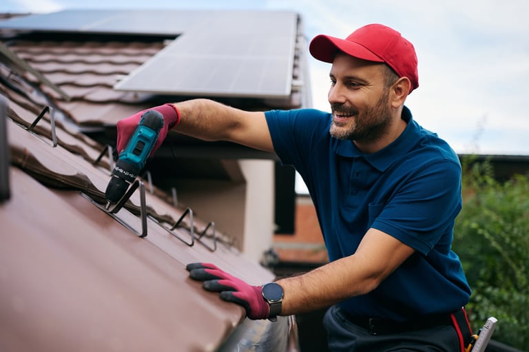 Roofer performing roof maintenance